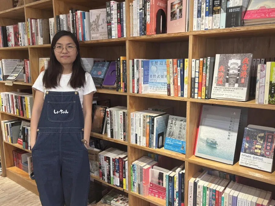 Mandy, a 29-year-old staff at independent bookshop Have A Nice Stay. She is also a journalist for the bookshop’s online magazine Subtext. (Lim Zhan Ting/SPH Media)
