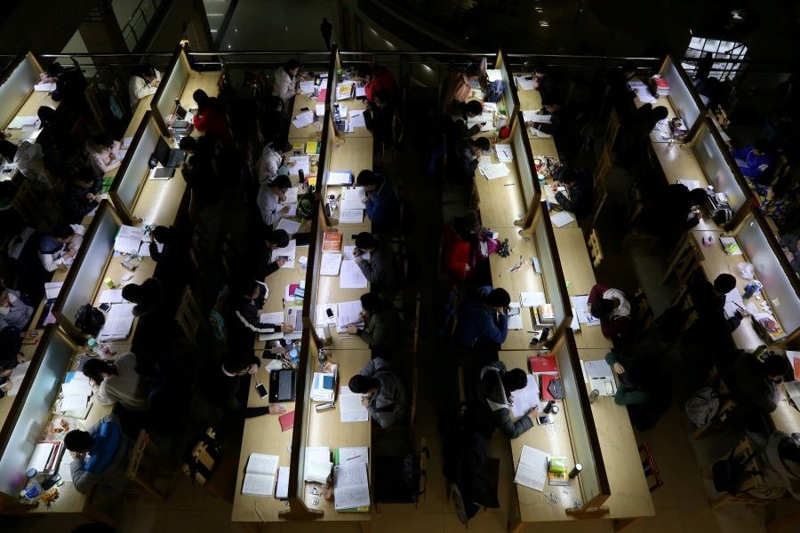 Chinese students studying before university entrance exams. Prof Cheng says China, Hong Kong, and Taiwan, are all gradually moving away from the model of the ancient Imperial exams. (Reuters)