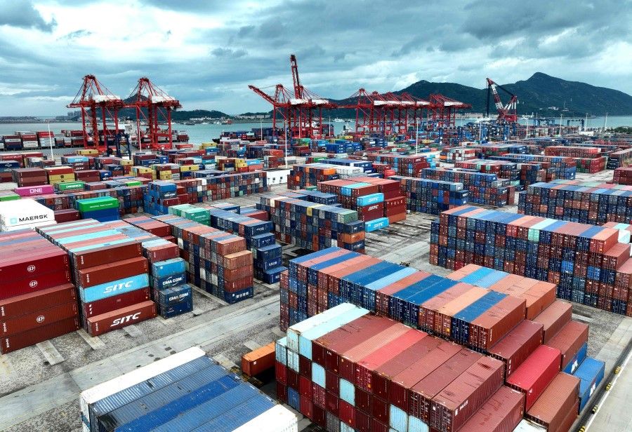 Containers are seen at the container terminal of Lianyungang Port, in China's eastern Jiangsu province, on 13 July 2023. (Stringer/AFP)