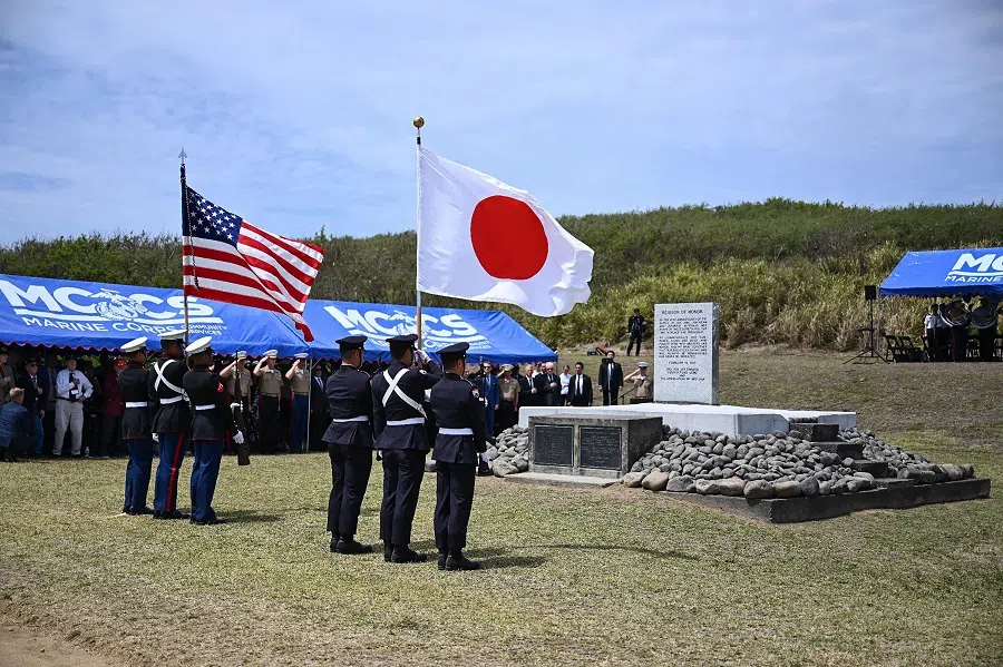 A joint US-Japan memorial service for the 80th anniversary of the Battle of Iwo Jima near the end of World War II is held in the village of Ogasawara on Iwo Jima island, on 29 March 2025. (Japan Pool/AFP)