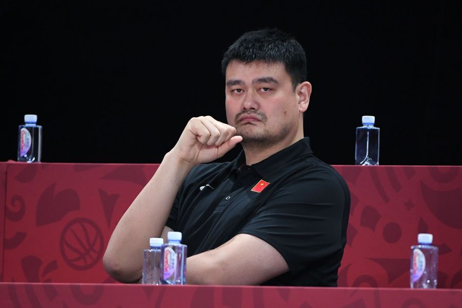 Imagine China as Yao Ming: Yao Ming has already grown up. It is possible to wound him but perhaps too late to curtail or hold back his growth. (STR / AFP)