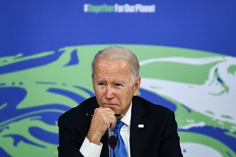 US President Joe Biden reacts during a meeting on "the Build Back Better World (B3W)", as part of the World Leaders' Summit of the COP26 UN Climate Change Conference in Glasgow, Scotland, on 2 November 2021. (Brendan Smialowski/AFP)