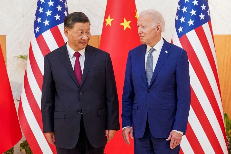 US President Joe Biden meets with Chinese President Xi Jinping on the sidelines of the G20 summit in Bali, Indonesia, 14 November 2022. (Kevin Lamarque/Reuters)
