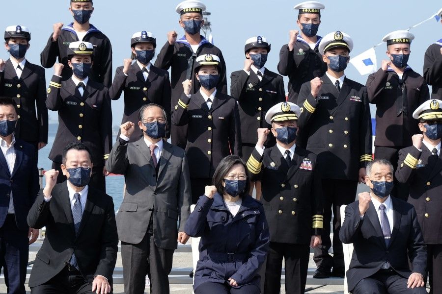 Taiwan President Tsai Ing-wen (front, centre) with navy soldiers at a navy base in Kaohsiung, southern Taiwan, on 14 January 2022. (Sam Yeh/AFP)