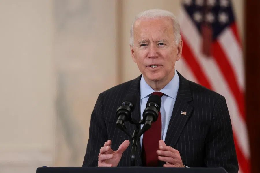 US President Joe Biden delivers remarks in honour of the 500,000 U.S. deaths from the coronavirus disease (COVID-19), in the Cross Hall at the White House in Washington, US, 22 February 2021. (Jonathan Ernst/Reuters)