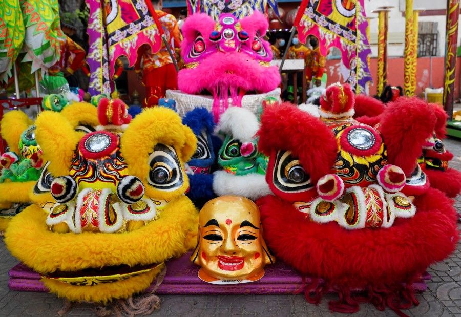 Lion dance heads are displayed at a temple in Phnom Penh, Cambodia, 21 January 2022. (Cindy Liu/Reuters)