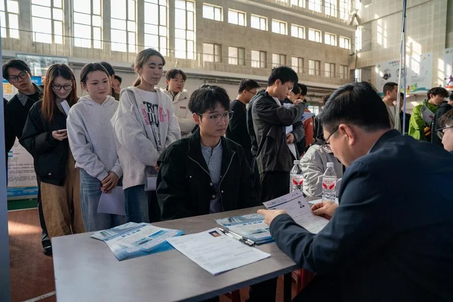 A shot of a public service employment campaign at Xinjiang Agricultural University in Urumqi on 29 March 2026. 