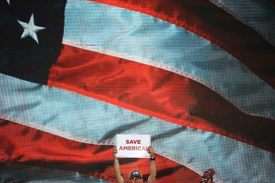 Thousands of supporters of former US President Donald Trump listen to local and state politicians speak during a "Save America" rally at York Family Farms on 21 August 2021 in Cullman, Alabama, US. (Chip Somodevilla/Getty Images/AFP)