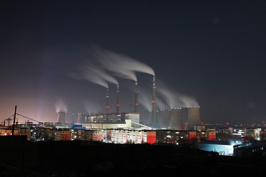 The coal-powered Datang International Zhangjiakou Power Station is pictured at night in Zhangjiakou, Hebei province, China, on 12 November 2021. (Greg Baker/AFP)