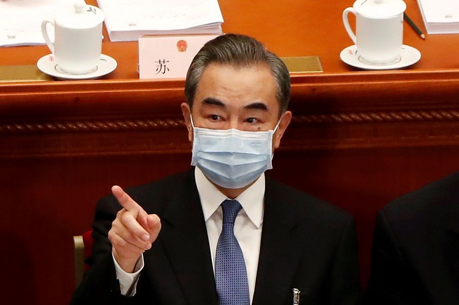Chinese Foreign Minister Wang Yi attends the opening session of the National People's Congress (NPC) at the Great Hall of the People in Beijing, China, 22 May 2020. (Carlos Garcia Rawlins/File Photo/Reuters)