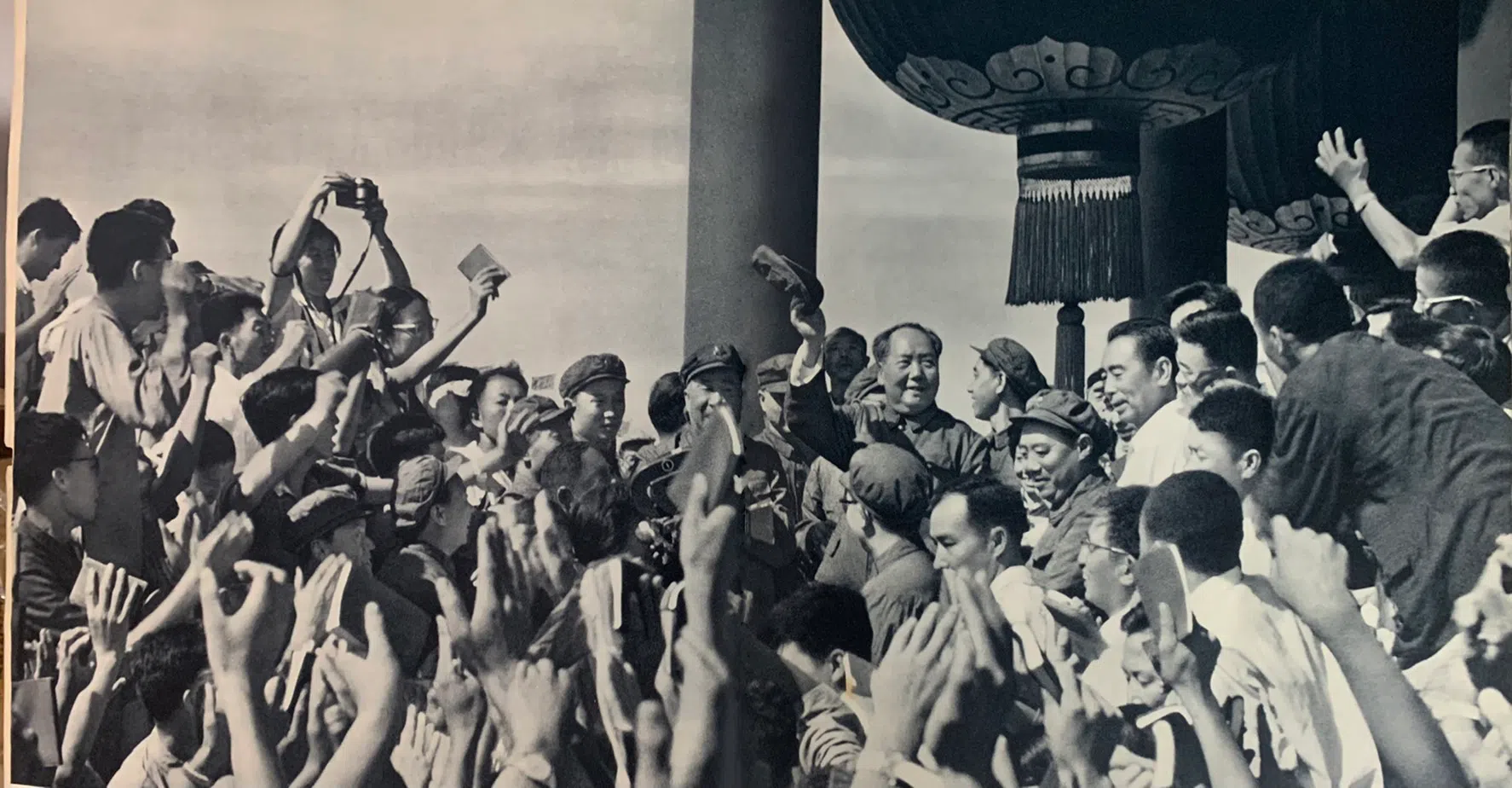 Mao the god-like political leader greeting students in Tiananmen Square, 1966.