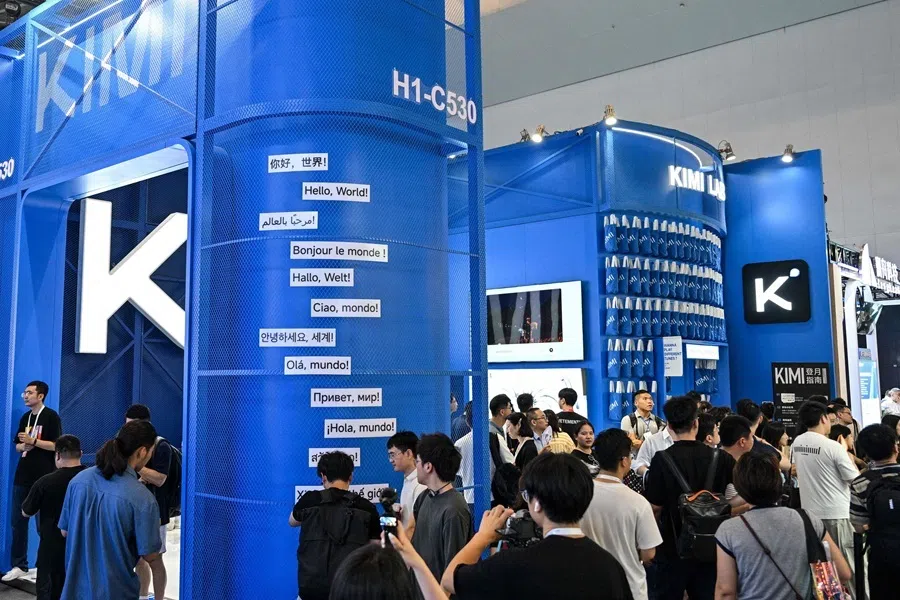 People visit the Moonshot AI stand, featuring the Kimi K3 model, during the World Artificial Intelligence Conference (WAIC) in Shanghai on 18 July 2026.