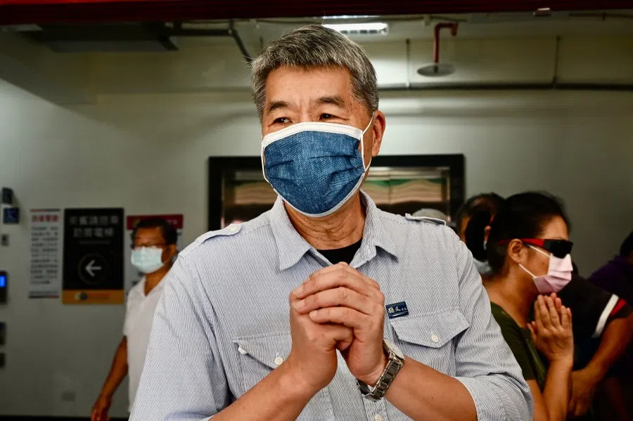 Chang Ya-chung, a chairman candidate of Taiwan's main opposition party Kuomintang (KMT) gestures after voting at a polling station in Taipei, Taiwan, on 25 September 2021. (Sam Yeh/AFP)