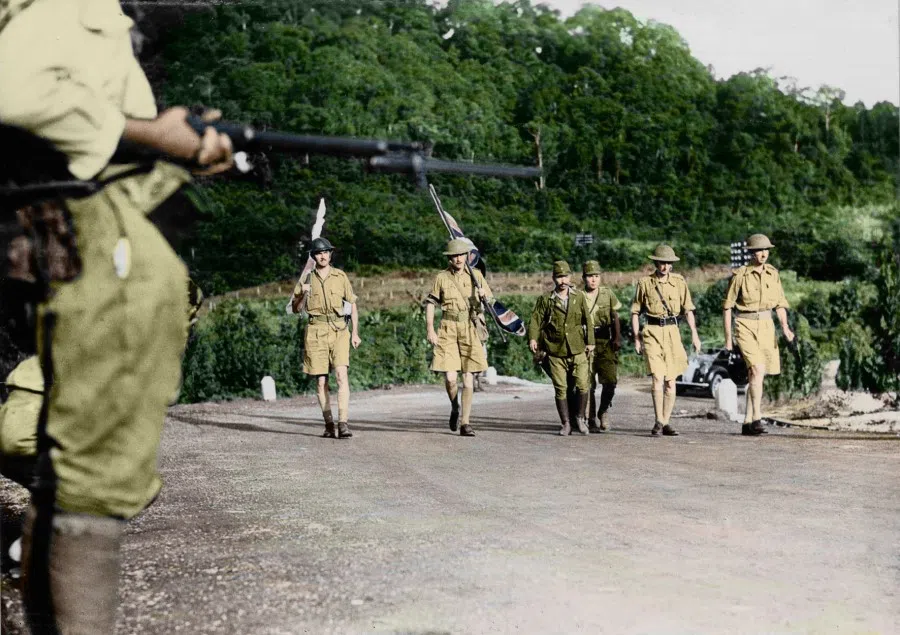 On 15 February 1942, Lt.Gen. Arthur Ernest Percival, general officer commanding Malaya for the British army, left the British army base with Japanese soldiers as he prepared to surrender to Lt.Gen. Tomoyuki Yamashita of the Imperial Japanese Army.