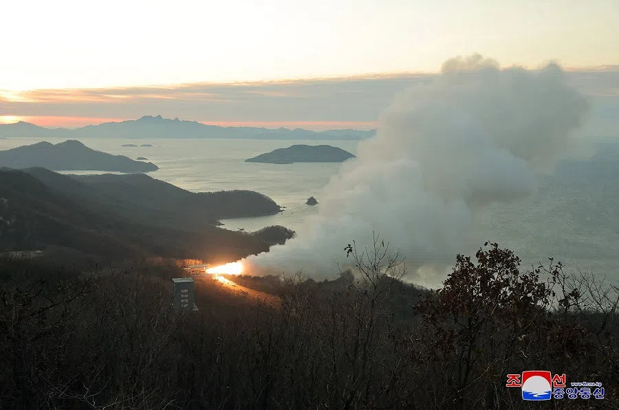 This undated picture released by North Korea's official Korean Central News Agency (KCNA) on 15 November 2023 shows the first ground combustion test of a high-power solid fuel engine for a new intermediate-range ballistic missile, at an undisclosed location in North Korea. (KCNA via KNS/AFP)