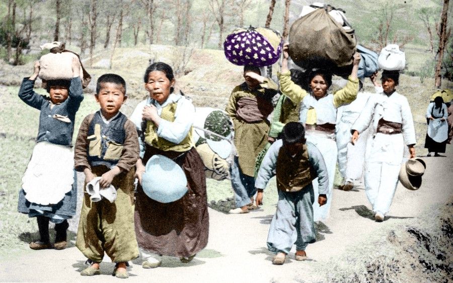 Korean civilians fleeing the war, 1951. The fighting resulted in huge loss of life and property.
