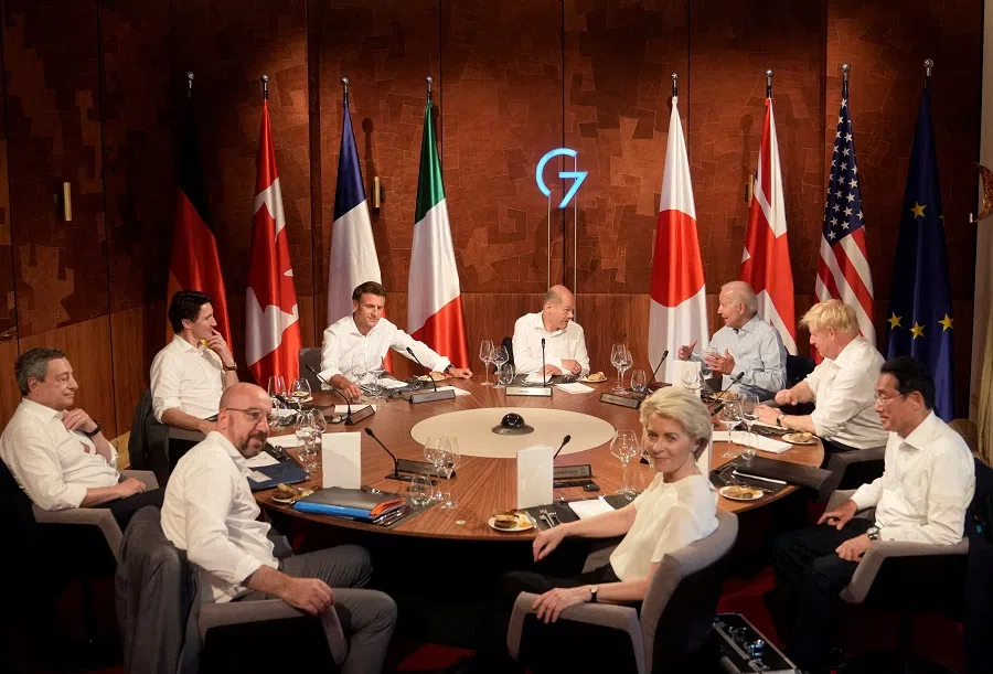 G7 leaders gather for a dinner event at Castle Elmau in Kruen, near Garmisch-Partenkirchen, Germany, on 26 June 2022. Leaders clockwise from front left: European Council President Charles Michel, Italy's Prime Minister Mario Draghi, Canada's Prime Minister Justin Trudeau, French President Emmanuel Macron, German Chancellor Olaf Scholz, US President Joe Biden, British Prime Minister Boris Johnson, Japan's Prime Minister Fumio Kishida and European Commission President Ursula von der Leyen. (Markus Schreiber/Pool via Reuters)