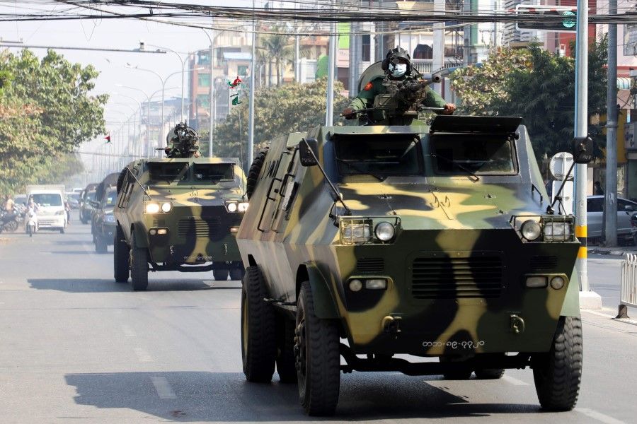 Armoured personnel carriers are seen on the streets of Mandalay on 3 February 2021, as calls for a civil disobedience gather pace following a military coup which saw civilian leader Aung San Suu Kyi being detained. (STR/AFP)