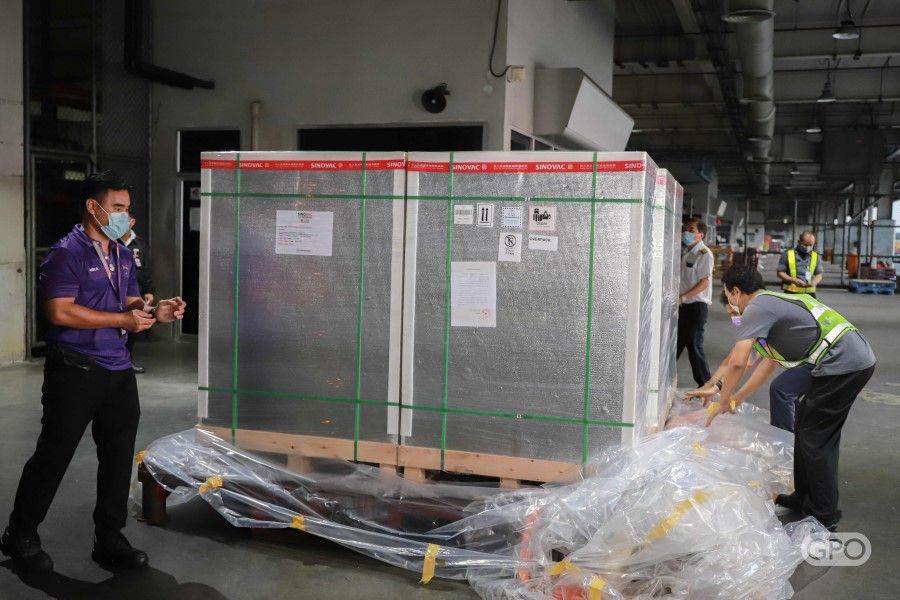 This handout photo taken and released on 24 April 2021 by the Government Pharmaceutical Organization (GPO) of Thailand shows a shipment of China's Sinovac vaccine for Covid-19 arriving in Bangkok, as part of efforts to halt the spread of the novel coronavirus. (Handout/Government Pharmaceutical Organization (GPO) of Thailand/AFP)