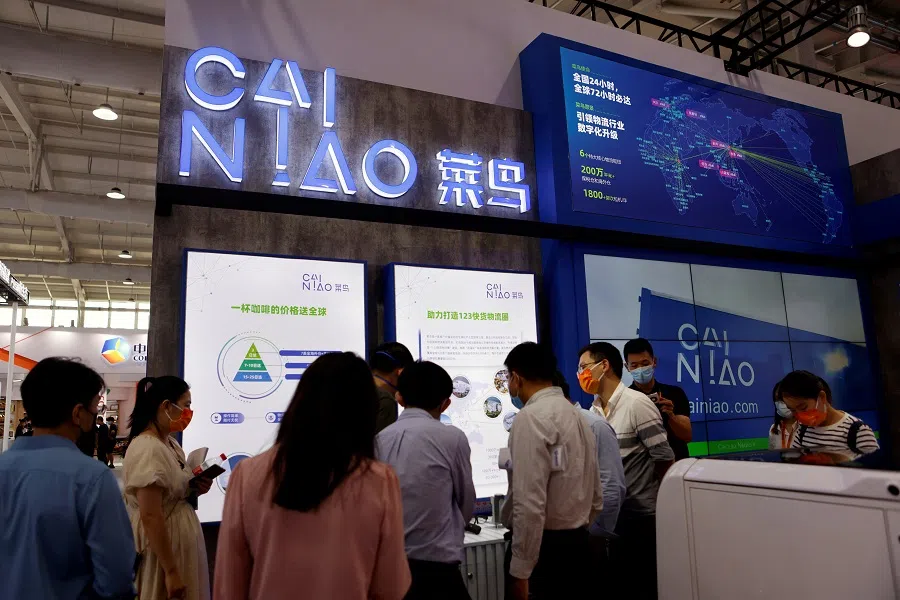 People visit the booth of Alibaba's logistics unit Cainiao at the 2021 China International Fair for Trade in Services (CIFTIS) in Beijing, China, on 3 September 2021. (Florence Lo/Reuters)