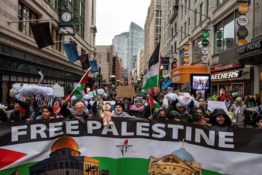 Demonstrators take part in a march in support of Palestinians in Boston, Massachusetts, US, on 17 December 2023. (Joseph Prezioso/AFP)