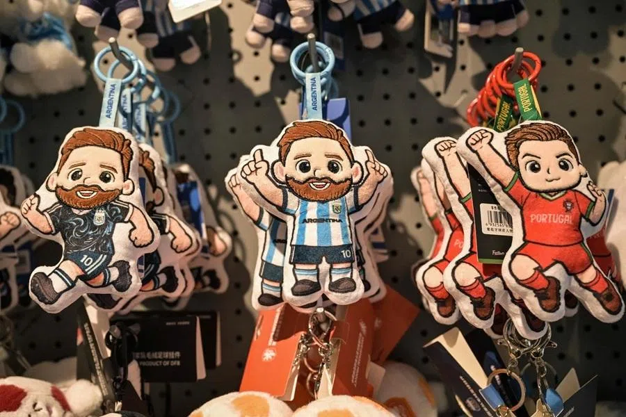 This photo taken on 5 June 2026 shows merchandise of Lionel Messi of Argentina and Cristiano Ronaldo of Portugal at the All Star Partner factory in Yiwu in China's Zhejiang province.