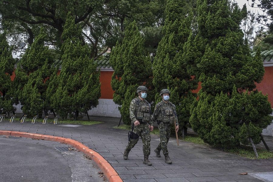 Soldiers walk past the National Revolutionary Martyrs' Shrine in Taipei, Taiwan, on 24 May 2022. (Lam Yik Fei/Bloomberg)