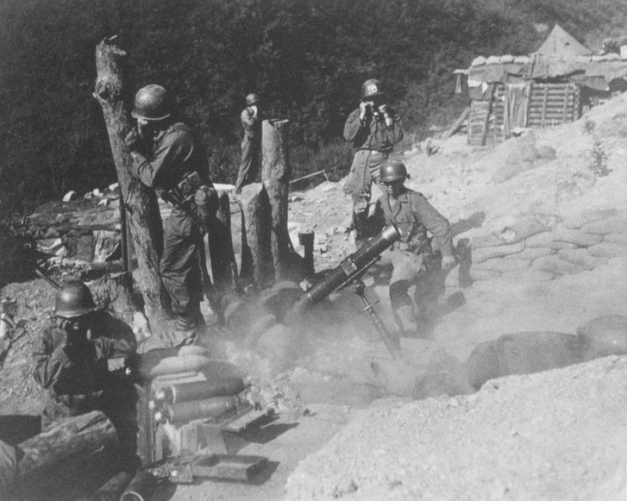 American troops secure a mountain top in Korea, undated. (Wikimedia)