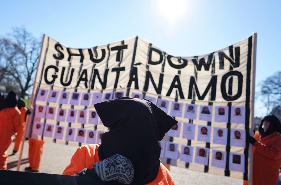In this file photo taken on 11 January 2016, demonstrators take part in a protest calling for the closure of the Guantánamo Bay prison in front of the White House in Washington, DC, US. (Mandel Ngan/AFP)