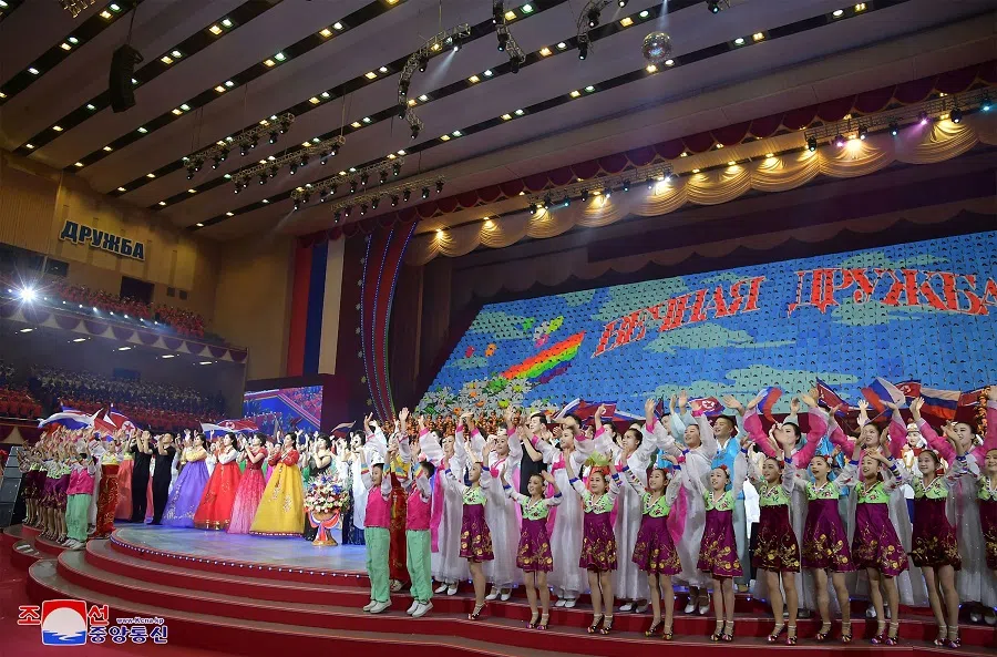 This picture taken on 19 June 2024 and released on 20 June 2024 from North Korea’s official Korean Central News Agency (KCNA) via KNS shows a concert to welcome Russia’s President Vladimir Putin at the Pyongyang Gymnasium in Pyongyang. (KCNA via KNS/AFP)