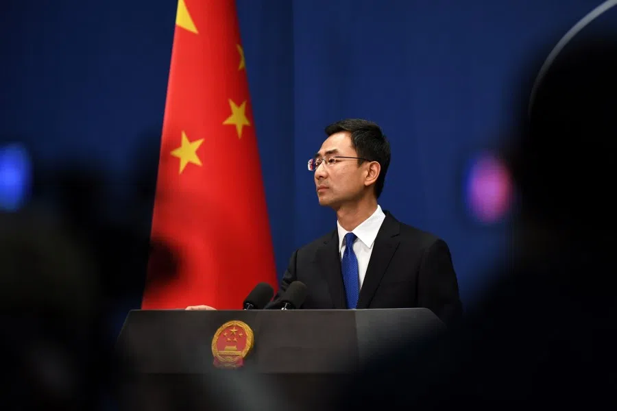 Chinese Foreign Ministry spokesman Geng Shuang listens to a question during the daily press briefing in Beijing on March 18, 2020. China on March 18 announced it would expel American journalists from three major US newspapers in one of the communist government's biggest crackdowns on the foreign press, escalating a bitter row over media freedoms. (Greg Baker/AFP)