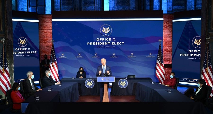 US President-elect Joe Biden, with Vice President-elect Kamala Harris, introduces nominees to his incoming administration on 11 December 2020, in Wilmington, Delaware. (Jim Watson/AFP)
