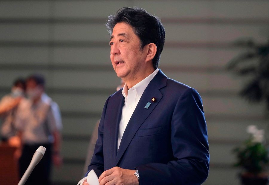 Japan Prime Minister Shinzo Abe speaks to the media upon his arrival at the prime minister's office in Tokyo on 19 August 2020. (Kazuhiro Nogi/AFP)