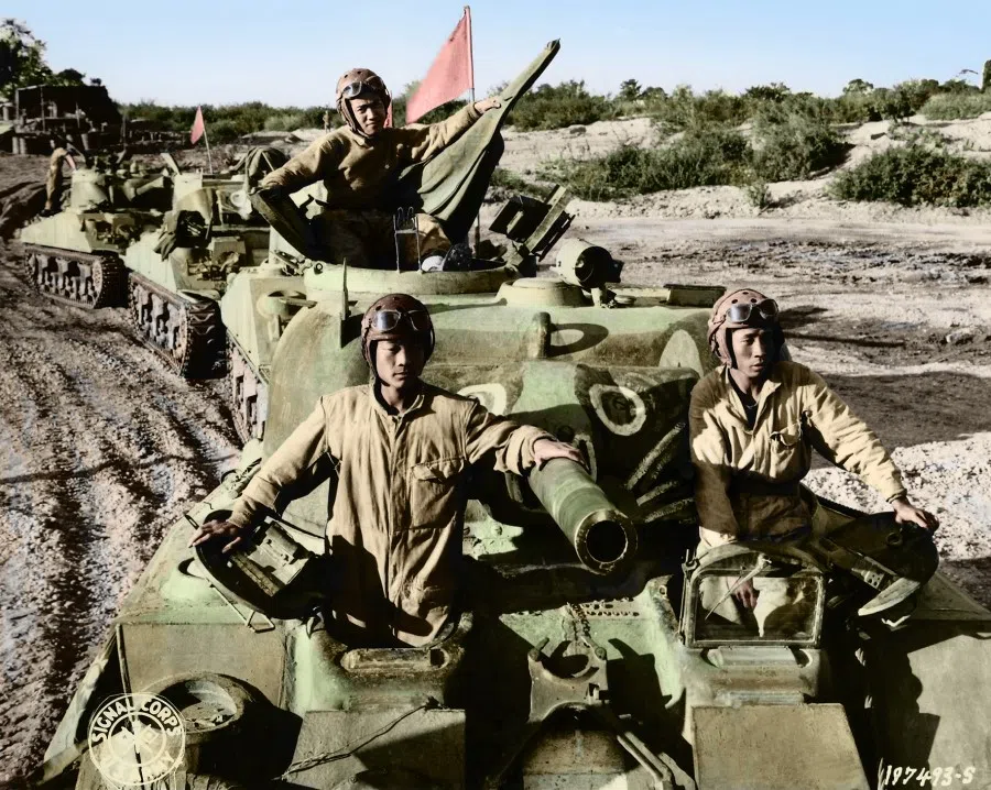 26 December 1944, India-Burma border - Members of the Chinese Expeditionary Force stationed in India are boarding the American M4A4 tanks, known as M4 Sherman, to push into northern Burma to support the offensives of the US-China Joint Forces. The Allied forces prioritised the recapture of Burma as a key ground operation in the Far East.