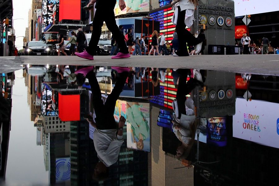 People walk through Times Square in New York City on 16 June 2023. (Leonardo Munoz/AFP)