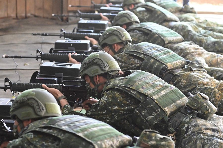 Taiwan's reservists take part in a military training at a military base in Taoyuan on 12 March 2022. (Sam Yeh/AFP)