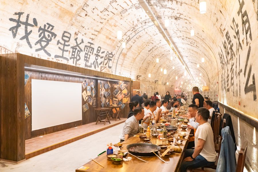 Visitors enjoy hotpot at the largest underground hot pot restaurant in Chongqing, China, on 27 October 2023. (CFOTO via Reuters Connect)