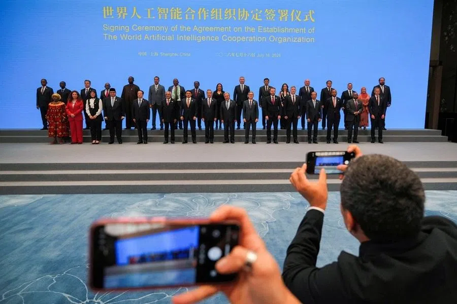 Signatories pose for photos after the signing ceremony of the Agreement on the Establishment of The World Artificial Intelligence Cooperation Organization in Shanghai, China, on 16 July 2026.