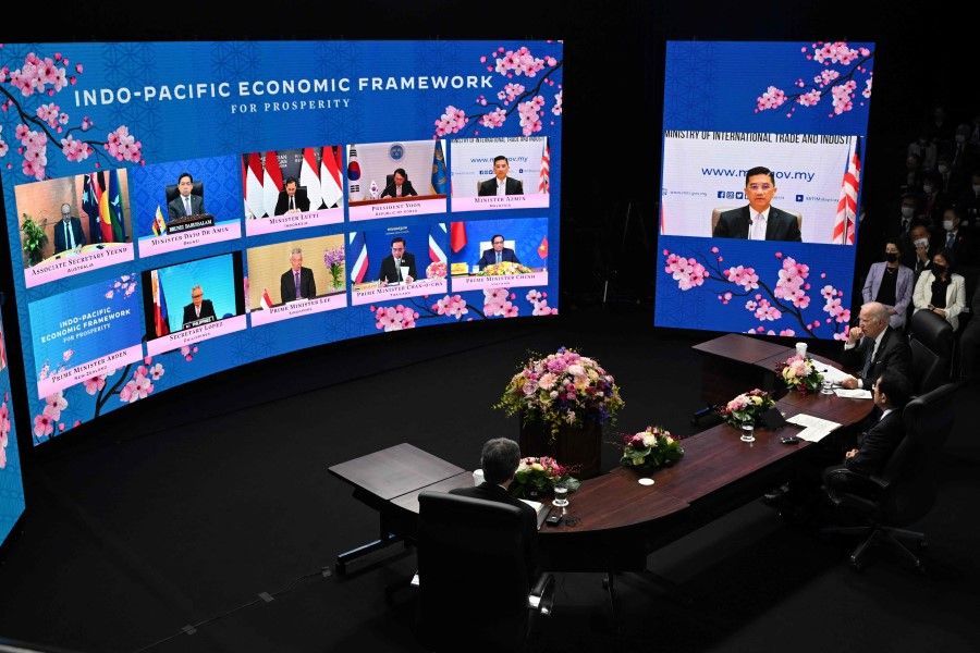 US President Joe Biden and Japan's Prime Minister Fumio Kishida attend the Indo-Pacific Economic Framework for Prosperity with other regional leaders via video link at the Izumi Garden Gallery in Tokyo on 23 May 2022. (Saul Loeb/AFP)