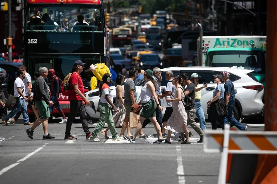 People in the Times Square neighbourhood of New York, US, on 24 May 2024. (Michael Nagle/Bloomberg)