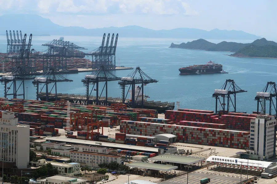 A cargo ship carrying containers is seen near the Yantian port in Shenzhen, Guangdong, China, 17 May 2020. (Martin Pollard/File Photo/Reuters)