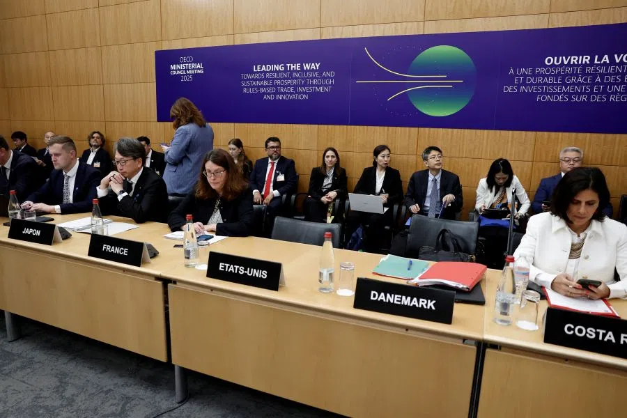 Delegates attend a session during the second day of the 2025 Ministerial Council Meeting at the OECD headquarters in Paris, France, on 4 June 2025. (Benoit Tessier/Reuters)