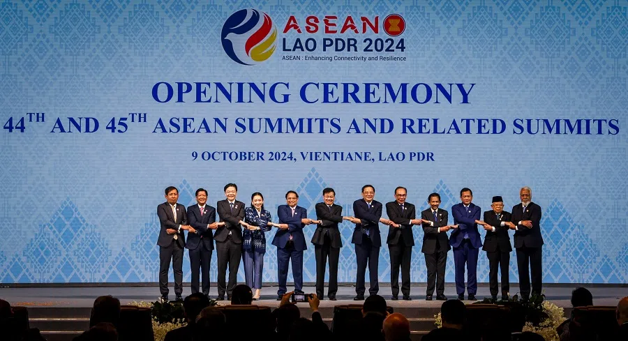 From left, Myanmar permanent secretary of Foreign Affairs Aung Kyaw Moe, Philippine President Ferdinand Marcos Jr, Singapore Prime Minister Lawrence Wong, Thai Prime Minister Paetongtarn Shinawatra, Vietnamese Prime Minister Pham Minh Chinh, Lao President Thongloun Sisoulith, Lao Prime Minister Sonexay Siphandone, Malaysian Prime Minister Anwar Ibrahim, Brunei Sultan Hassanal Bolkiah, Cambodian Prime Minister Hun Manet, Indonesian Vice-President Ma’ruf Amin and Timor-Leste Prime Minister Xanana Gusmao at the opening ceremony of the 44th and 45th Asean Summits and Related Summits in Vientiane, Laos, on 9 October 2024. (SPH Media)