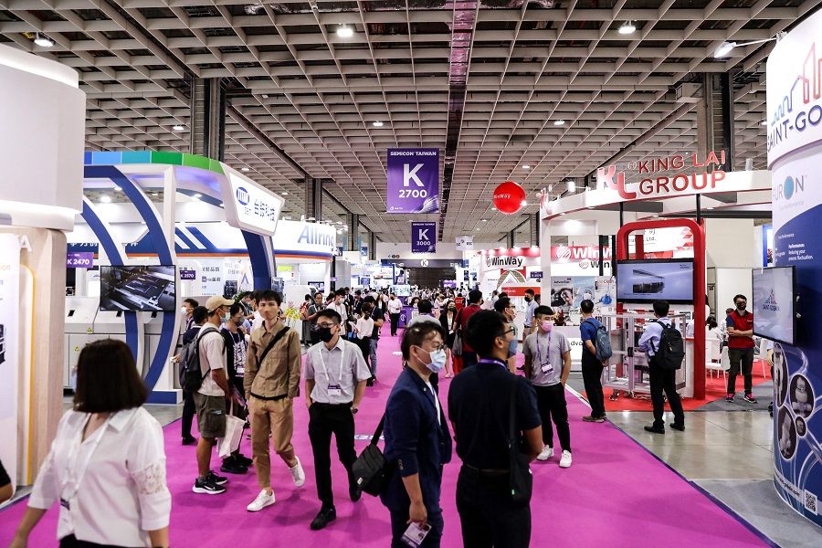 People visit SEMICON Taiwan 2022 where over 700 product manufacturers are participating in Taipei, Taiwan, on 15 September 2022. (I-Hwa Cheng/AFP)