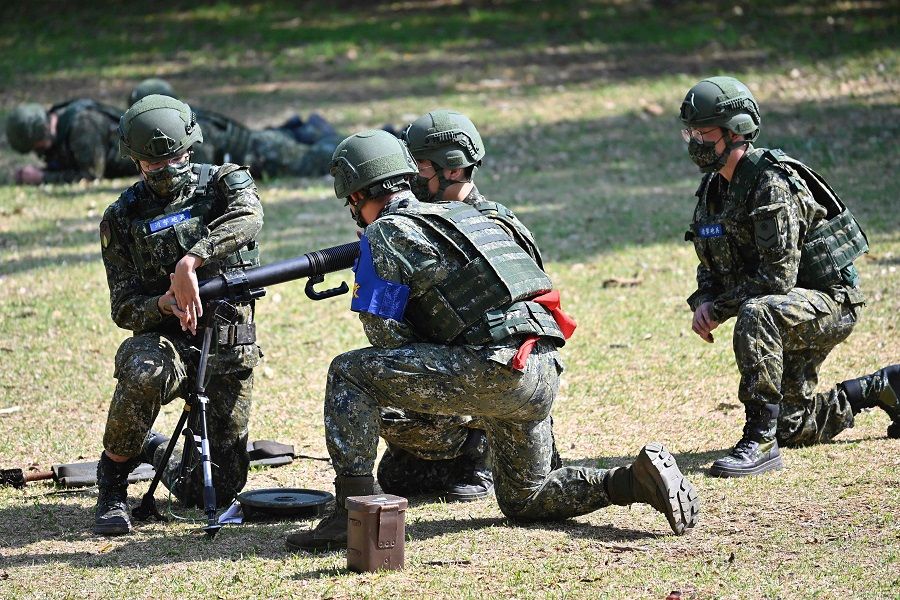 Taiwan's reservists take part in a military training at a military base in Taoyuan, Taiwan, on 12 March 2022. (Sam Yeh/AFP)