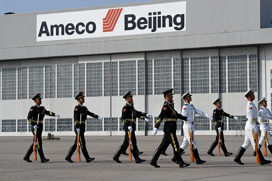 Chinese honour guards prepare for the arrival of Russia's President Vladimir Putin ahead of the Third Belt and Road Forum at Beijing Capital International Airport in Beijing, China, on 17 October 2023. (Parker Song/Reuters)