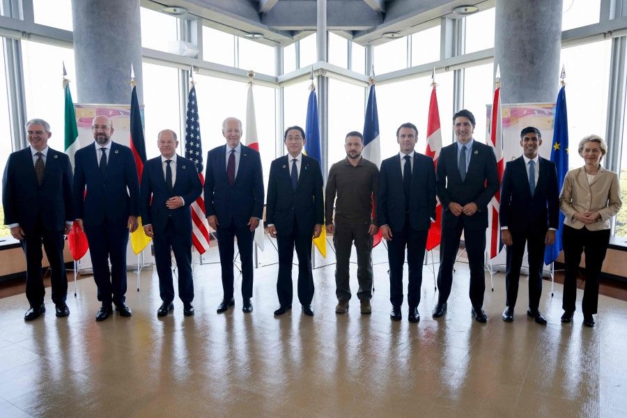 Ukraine's President Volodymyr Zelensky (fifth from right) poses with G7 leaders for a family photo during the G7 Leaders' Summit in Hiroshima on 21 May 2023. (Ludovic Marin/AFP)
