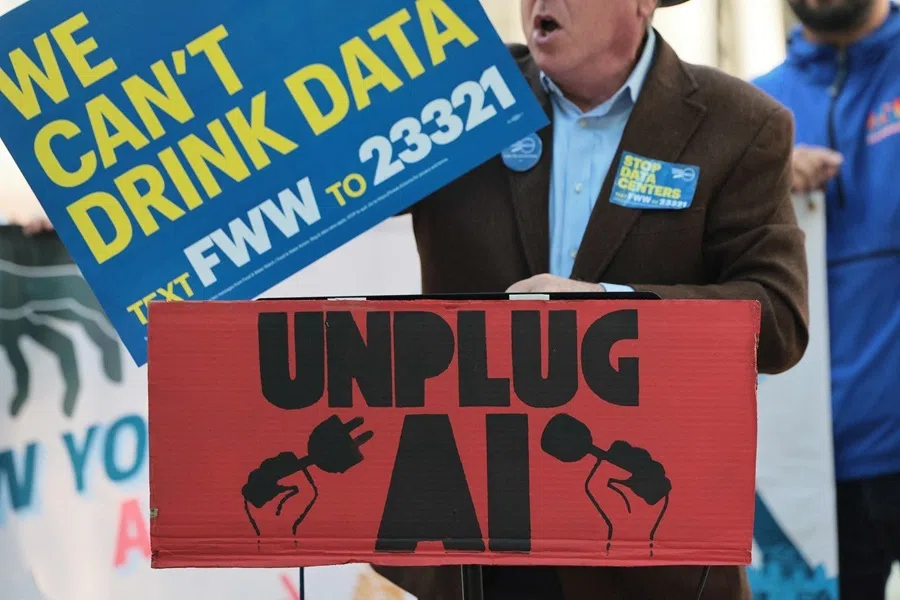 People protest artificial intelligence (AI) and data centres ahead of a New York City Council Committee hearing on the risks and regulation of AI, at City Hall Park on 5 October 2026 in New York City.