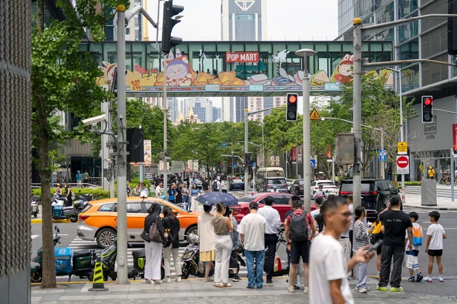 An advertisement for Pop Mart International Group Ltd.’s Labubu doll in Shanghai, China, on 19 June 2025. (Raul Ariano/Bloomberg)