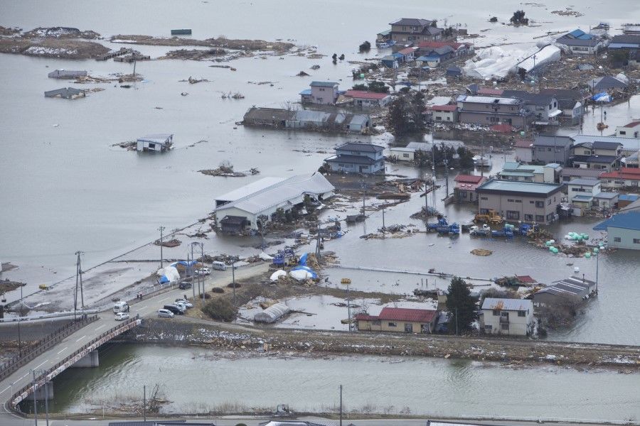 An aerial view of Ishinomaki, Japan, a week after a 9.0 magnitude earthquake and subsequent tsunami devastated the area. (U.S. Marine Corps photo by Lance Cpl. Ethan Johnson/Wikimedia)